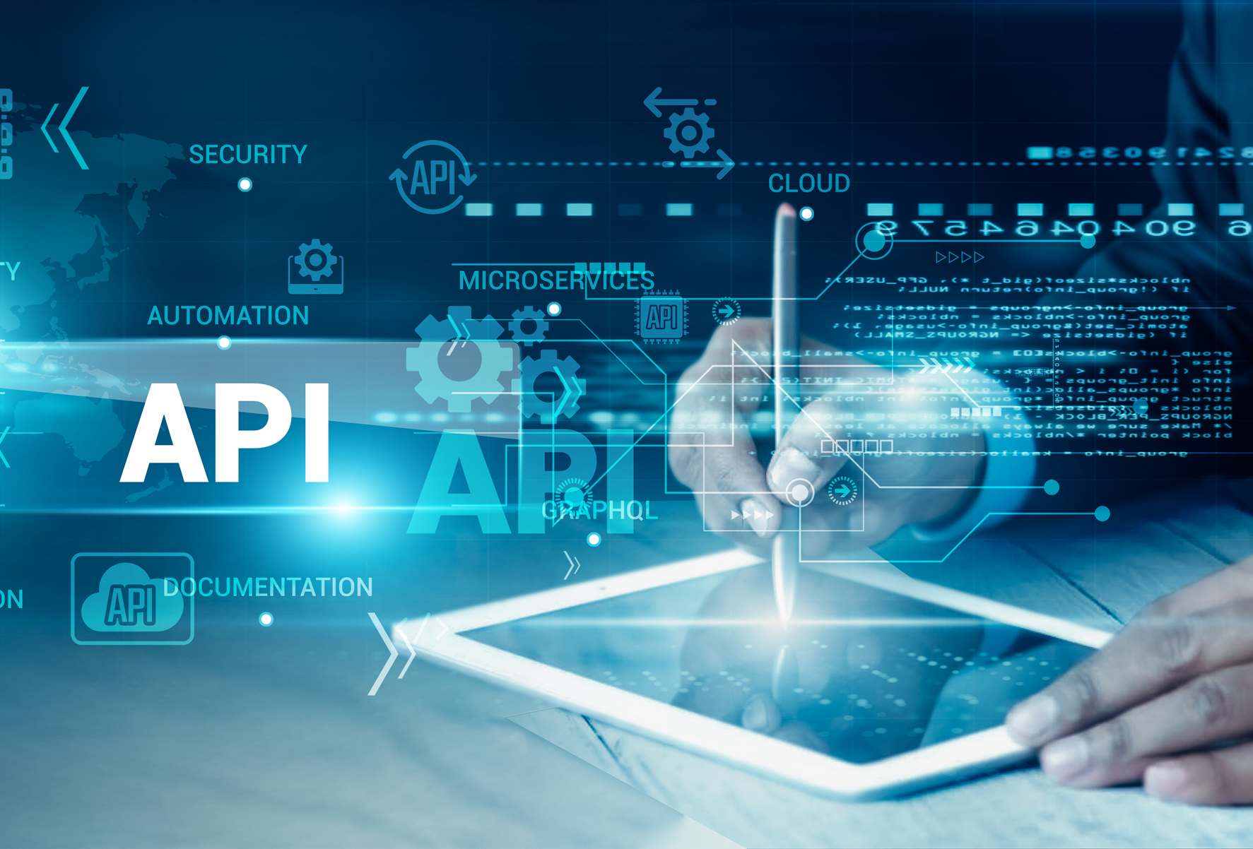 A hand is writing on a tablet on a desk. It's overlayed by tech words and symbols with the word 'API' prominent. It has a blue hue.